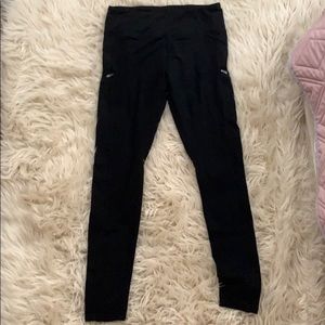 black leggings marked as a medium fit a small